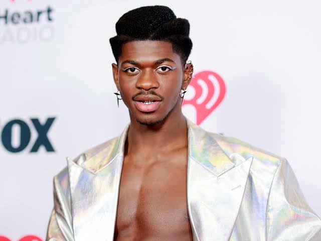 In A Wave Of Fake Promotional Offers, Lil Nas X Teams Up With Grindr, A Homophobic Dog, And Others, Yours Truly, News, December 1, 2023
