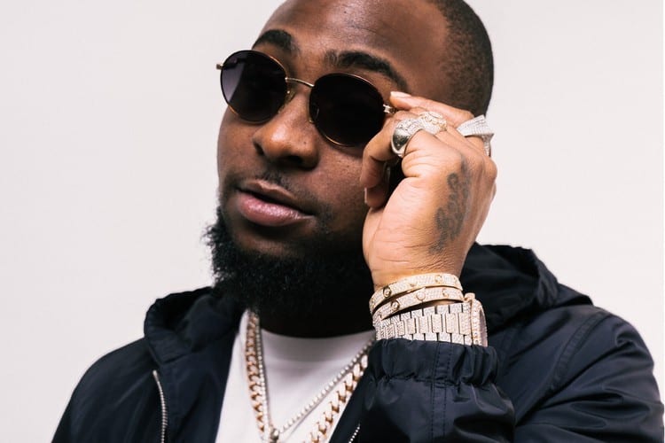Davido Arrives In Qatar With A Personalized Blanket Bearing Ifeanyi'S Face, Yours Truly, News, March 23, 2023